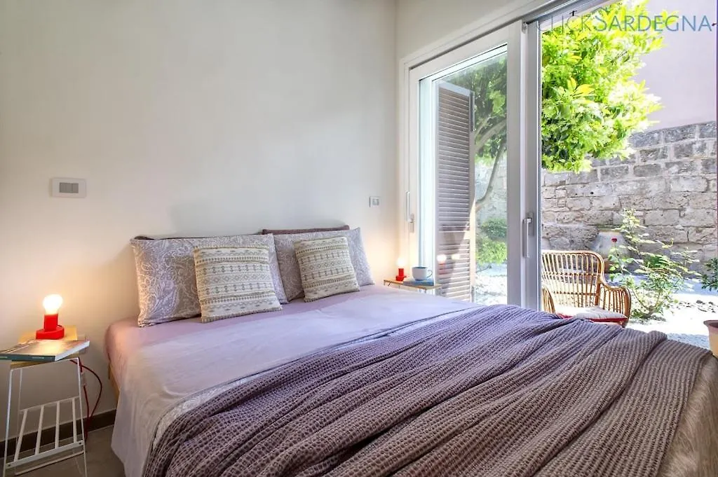 Neptune Waterfront Apartment: Alghero Seaside Retreat 0*,  Italy