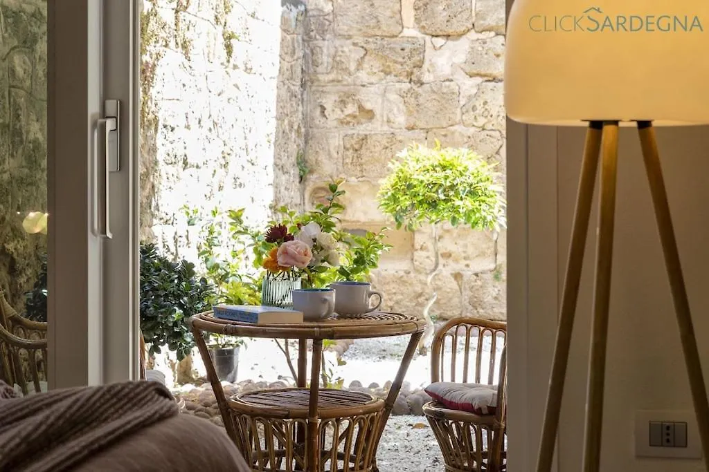 Neptune Waterfront Apartment: Alghero Seaside Retreat 0*,  Italy